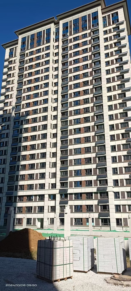 福港御景项目：啄木鸟漆业有序推动外墙真石漆生产完成供货与交付